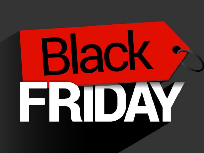 uma etiqueta vermelha com a palavra black e a palavra friday logo abaixo em um fundo cinza escuro